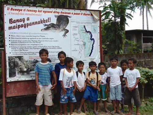 Figure 3. Billboard with the slogan of the public awareness campaign of the Mabuwaya Foundation: “banag a maipagpannakkel!” (something to be proud of!). Photo by M van Weerd (2008).