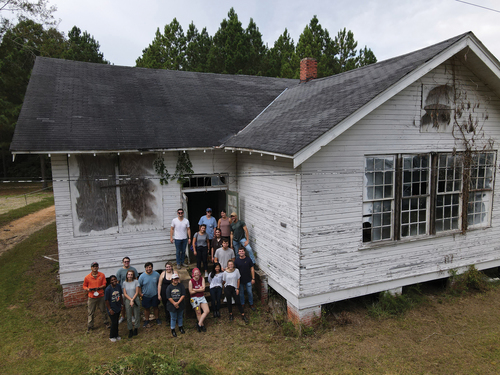 Figure 4. Architecture seminar students surveying the Tankersley Rosenwald School. Photograph by author.