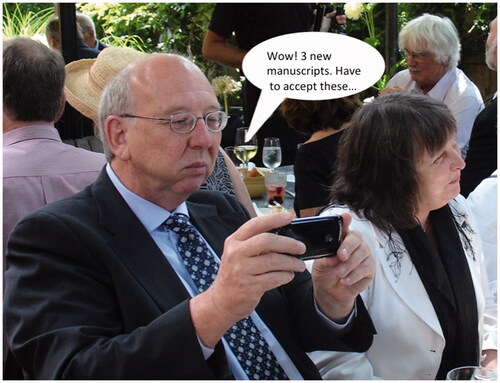 Figure 3. Stan and Lillian Heptinstall at an informal lunch in Boston in 2009. An editor’s work is never done!.