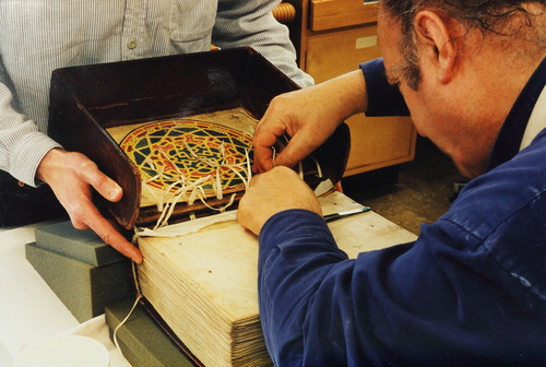FIGURE 4. Chris Clarkson and Robert Minte in 1999 reattaching the box binding of MS. Kennicott 1 (The Bodleian Libraries, The University of Oxford, MS. Kennicott 1, conservation report).
