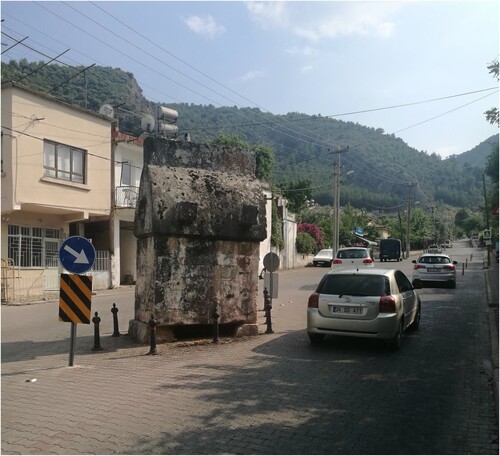 Figure 2. A Lycian stone sarcophagus in the middle of a street in the Keşikkapı quarter of Fethiye. (Photo credit: Alan M. Greaves).