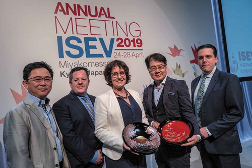 Figure 1. ISEV2019 Special Achievement Awards. Awards were presented to Marca Wauben (middle) and Takahiro Ochiya (second from right) by ISEV2019 Chair Hidetoshi Tahara (left), ISEV President Andrew Hill (second from left), and ISEV Chair of Science and Meetings Kenneth Witwer (right).