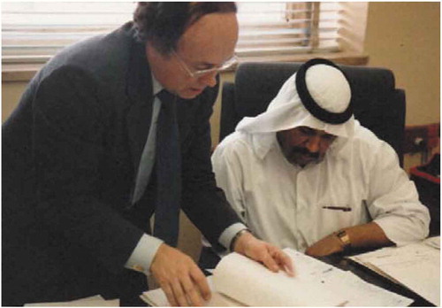 Figure 4. Gottfried Konecny discussing GIS application for Utility Systems in Kuwait, 1981
