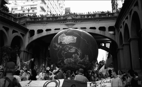 Street demonstration at the opening of the World Social Forum, Porto Alegre, January 2005. “[G]roups that are supportive of WSF‐type agendas have been able to exercise considerable power within national states…thus creating a somewhat different basis for 'nationalist' opposition to neoliberalism (e.g., factory occupations in Argentina, Bolivarian circles in Venezuela).” (Photograph by Ken Gould)