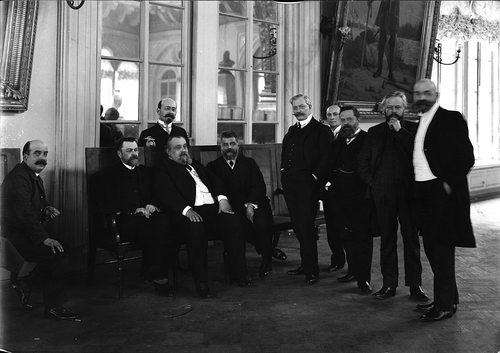 Figure 3. Leaders and members of liberal parties, Saint Petersburg, 1906. Left to right, seating: G. R. Kilevein, V. D. Kuz’min-Karavaev, M. M. Kovalevskii, M. A. Stakhovich; standing: I. V. Gessen, P. N. Miliukov, ?, A. V. Vasil’ev, A. A. Kornilov, A. A. Stakhovich. Source: TsGAKFFD SPb, E19109; RNB, E AlP/2-187, Ei 25187.