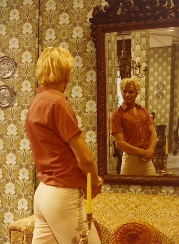 Image 2. Adam watching himself in the mirror. Used with permission from the Slovenian Film Centre and the Slovenian Cinematheque.