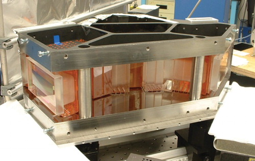 Fig. 4 SWIFT-DASH monolithic optics assembled in a rigid frame. The gratings are visible in each arm.