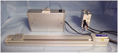 Figure 1. Electric actuator. The slide table position and movement speed are automatically controlled with a computer. The positioning accuracy is <0.1 mm.
