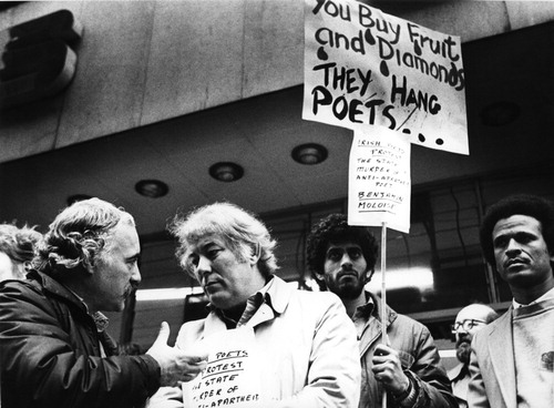 Figure 5 Seamus Heaney, Dunnes stores workers and other protestors demonstrating in Dublin to protest against the execution of South African activist and poet Benjamin Moloise. Photograph by Eamonn Farrell, reproduced courtesy of the photographer.