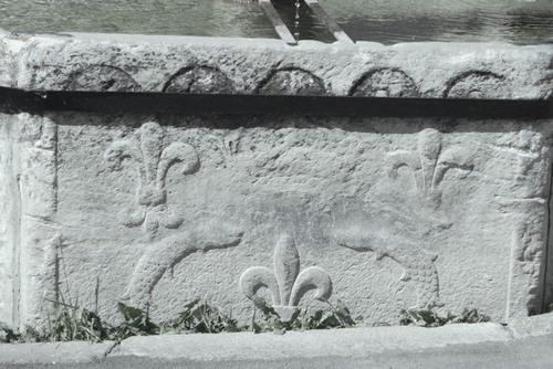 Figure 5. Sauze di Cesana fountain, seventeenth century. Symbols of the Dauphiné and the fleur-de-lis.