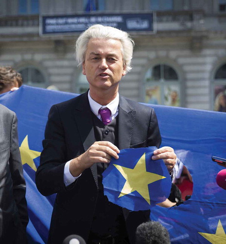 Figure 1. Geert Wilders cutting the 'Dutch' star out of the EU flag. Reproduced with permission: AP Images/Hollandse Hoogte.