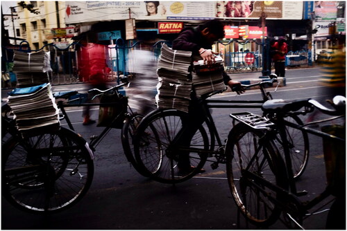 Figure 2. Vendor cyclists gather at dawn for newspaper collection and distribution. Kolkata 2016 © Malini Sur.