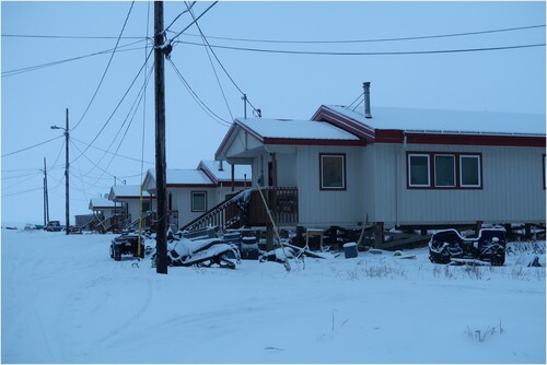 Figure 6. Example of a row of standardized houses in Shishmaref (photo taken by the author).