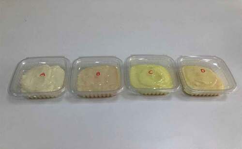 Figure 1. Muhallebi samples, A: Control Muhallebi, B: Muhallebi supplemented with 0.02% saffron, C: Muhallebi supplemented with 0.02% turmeric powder, D: Muhallebi supplemented with 0.02% saffron and turmeric powder.