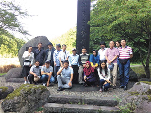 Figure 2. Partial participants visited the LUMC site near Kumagai Shrine, Shonai Town, where was known as birthpace of famous rice cultivar Kamenoo.