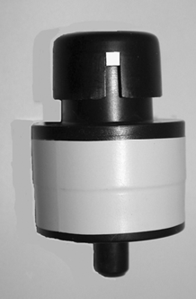 FIG. 2 Side view of the BA filter cassette showing one of the 3-mm square sample inlets.