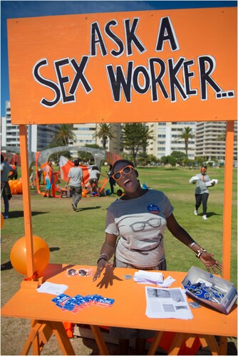 Figure 6. ‘Ask a sex worker’ information booth on the Sea Point Promenade, Cape Town. Photo Credit Centre for Artistic Activism.