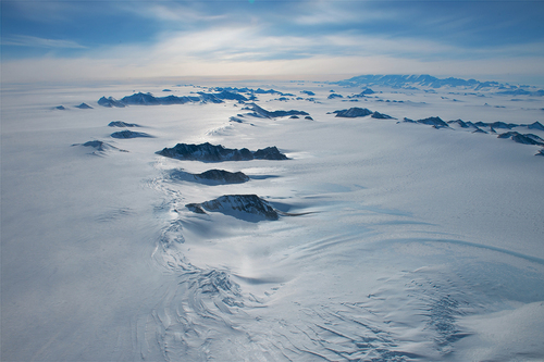 Figure 1. Nunataks—or mountain peaks projecting up above a surface of inland ice and snow—show up clearly in this aerial image of Ellsworth Land in West Antarctica. All images taken by Pete Bucktrout / British Antarctic Survey in December 2011.