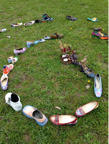 Figure 1. Making a labyrinth of painted shoes at Kutenai Art Therapy Institute.