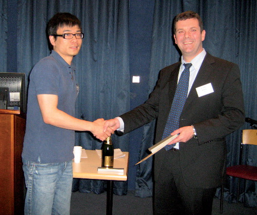 Figure 1. Brendan Fish with poster prize winner Kevin Kuo.