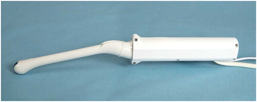Figure 1. The transvaginal probe with the force-measuring device mounted on the probe handle.