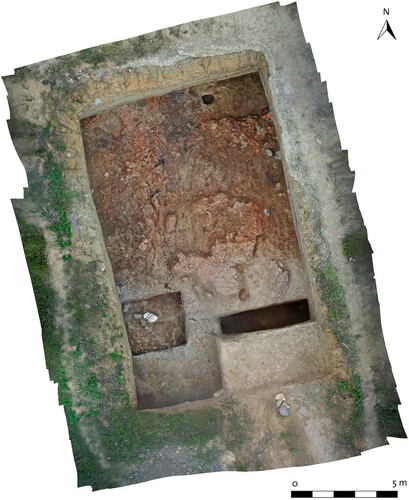 Figure 14. Trench 9 with traces of earthen building materials and wooden architecture visible during the excavation in Dateshidze (Photo credit: R. Bieńkowski).