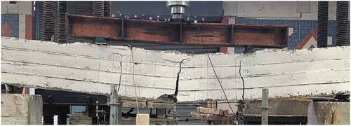 Figure 16. Cracks at failure of tested beams.