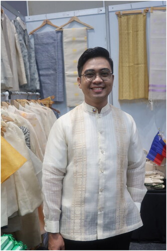 Figure 10 Carlo Eliserio wearing a piña-seda Barong Tagalog with buttons in the front at the Likha 2023 festival Taguig June 13, 2023.