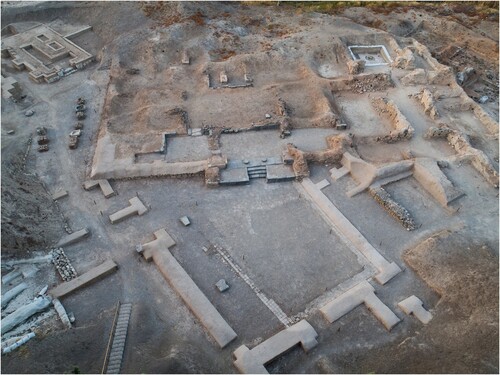 Figure 12. The partially completed mud plastering work at the LBA Palace.