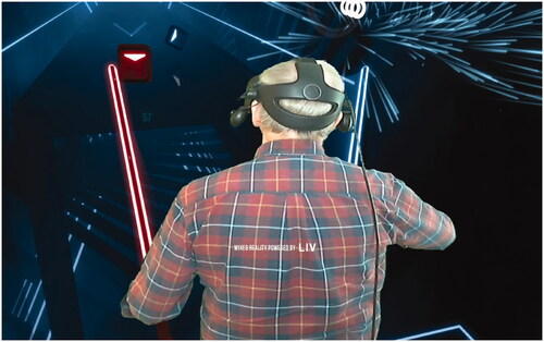 Figure 1. Participant playing the VR-game Beat Saber.