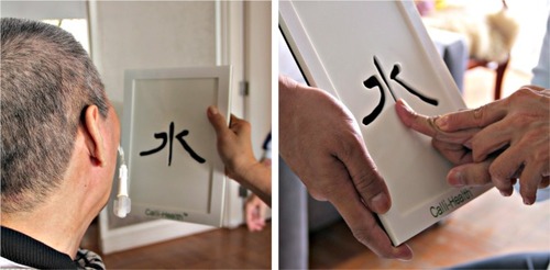 Figure 4 Calligraphy training being conducted on the patient with the help of three nursing staff. One helped him to sit up and position his head upright, the second one helped and directed his attention and showed him to focus on the task character (top left), and the third one held his index finger and ran it through the strokes of the Chinese character on the board (top right).