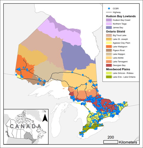 Figure 1. Locations of confirmed cyanobacterial blooms (CCBR) reported to the Ministry of the Environment, Conservation and Parks between 1994 and 2019 (blue dots) across the province of Ontario. Colored areas display ecoregion, and black lines represent freeways and highways (Ontario Road Network Citation2018).