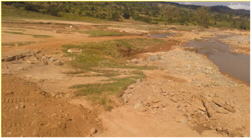 Figure 2. ‘These are the remnants of what was formerly a hub of business and urban growth point, with homes and shop – laid to the ground by the ravage of Cyclone Idai’. The female farmer who shared this (in a photovoice narrative at the Peacock tuckshop area, near Machongwe) described how this place became desolate and filled with rock debris, with the picture hinting at how people lost homes, businesses, land for agriculture and loved ones due to the cyclone.