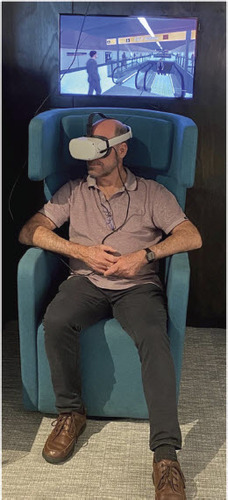 Wayne Stasinowsky enjoying the VR railway station experience.