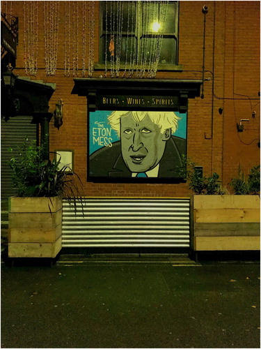 Figure 3: Photo of street art in Manchester, England, depicting Prime Boris Johnson which reads ‘The Eton Mess’, a reference to Boris Johnson's private school education in Eton, in the context of perceptions of a London-centric approach to pandemic management and conflicts between leaders of several northern cities and the UK Government over the terms of localised restrictions. Image credit: Jon Silver