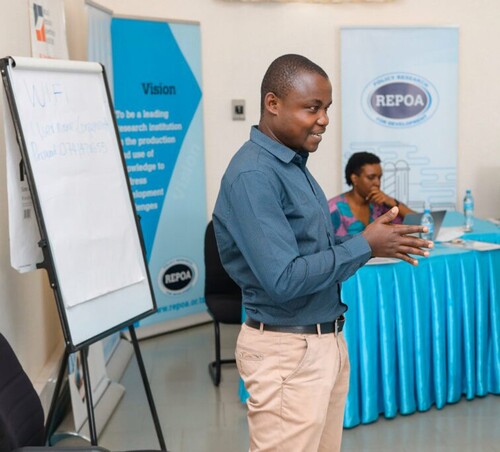 Figure 1. Dr Japhace Poncian talking on mining and linkages to the wider economy, part of a REPOA/NRGI training workshop held on 27 August 2019 on how Tanzania can best harness its natural resources for the realisation of its development goals. (Photo by courtesy of REPOA, a Tanzanian non-profit NGO and leading independent research institution in Tanzania specialising in policy research on socio-economic and development issues.)