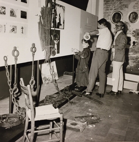 Fig. 6. The chains are part of one of the thematic displays, “The Prison and the Madhouse”. Stavenow-Hidemark is on the left and Mörk is standing on the right. Photo: 1966, Nordiska museets arkiv.