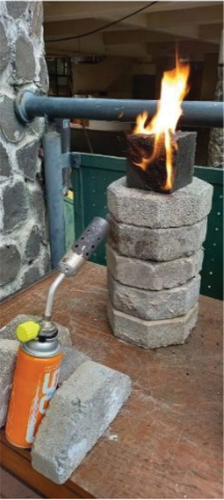 Figure 4. The preliminary fire test process uses a blowtorch.