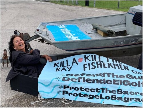 Figure 10 Diane Wilson in the coffin she set up at the Galveston, Texas office of the US Army Corps of Engineers (Rogers Citation2021). Photo by Diane Wilson, reproduced with permission.