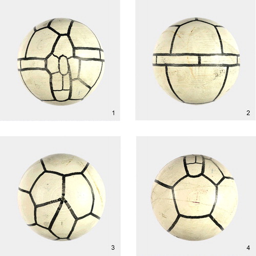 Plate 15. The model of the tabulation in gonyaulacacean dinoflagellates used by Bill Evitt for his Teaching Conferences on Fossil Dinoflagellates (section 10). It is based on a sexiform gonyaulacoid form which exhibits neutral torsion, and has a longitudinal (L-type) sulcus which is subdivided into platelets (Evitt Citation1985). A candidate genus would be Leptodinium. The tabulation formula is: 4', 6'', 6c, 6''', 1p, 1'''', 6s. No preapical plates were represented, in the interests of simplicity and because of the great variability of these small plates (Evitt Citation1985, figs 5.8, 5.12, 5.16). This model is simply a wooden polo ball which has been painted white and annotated. The polo ball is 8.5 cm in diameter. Note the faint traces of plate numbering made by one of us (JBR). Figure 1. mid-ventral view; figure 2. mid-dorsal view; figure 3. apical view, sulcus facing downwards; figure 4. antapical view, sulcus facing upwards.