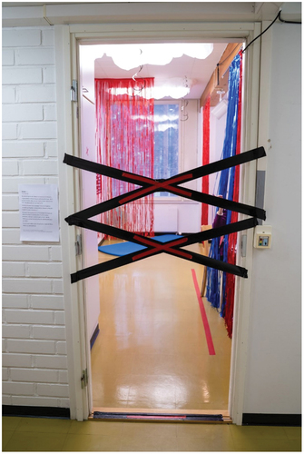 Figure 1. Duct tape across the doorway. Image from research data.