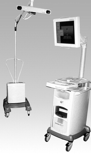 Figure 3. The Navitrack navigation system used in the study. An opto-electronic infrared camera tracks the passive rigid bodies attached to the femur and pointer (www.centerpulse.com).