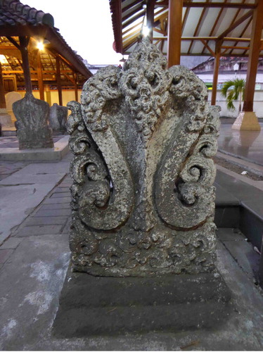 Figure 13. S-curlicue framing a heart-shape motif on a gravestone in the complex of Maulana Ibrahim, East Java. Photo by R. Michael Feener, 2015.