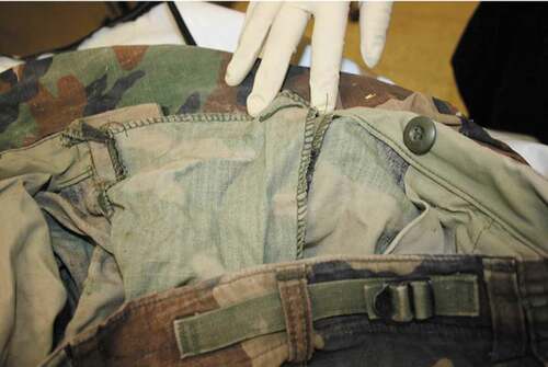 Figure 1. Pants found with unidentified remains which featured the sewing work of the decedent’s mother, who recognized her own sewing, resulting in the forensic identification of her son. Photo used with permission from Dr. Caitlin Vogelsberg, Pima County Office of the Medical Examiner.