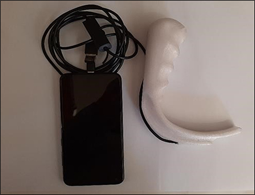 Figure 2 The novel device used in this study. The 3D printed VL blade and handle are attached to a commercially available 6.5 mm borescope camera inserted into a Samsung® Galaxy A11 smartphone.