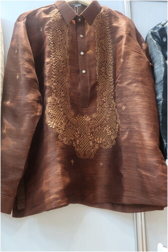 Figure 11 Natural dyed brown Barong Tagalog in piña-seda by Raquel’s Piña products.