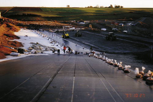 Figure 2. Geomembrane installation as part of the construction of a base liner system of a landfill. Source: Schicketanz, Aachen.