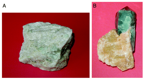 Figure 2. Polycrystalline (A) and single-crystalline (B) FA of a geological origin. The single crystal has a gray-green color due to incorporated ions of transition metals.