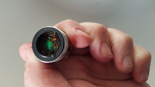Figure 1. An example of particulates observed in a faucet aerator, Flint, MI (Photo credit: Peggy Donnelly, EPA).
