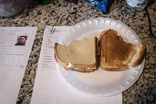 Recently released detainees are greeted with food options upon arrival.